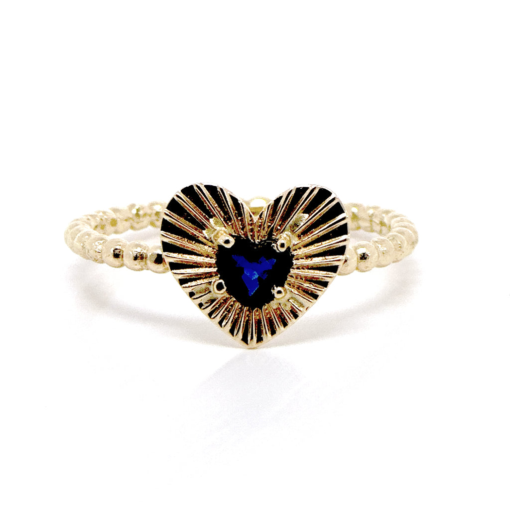 Anillo diamantado y zafiro azul