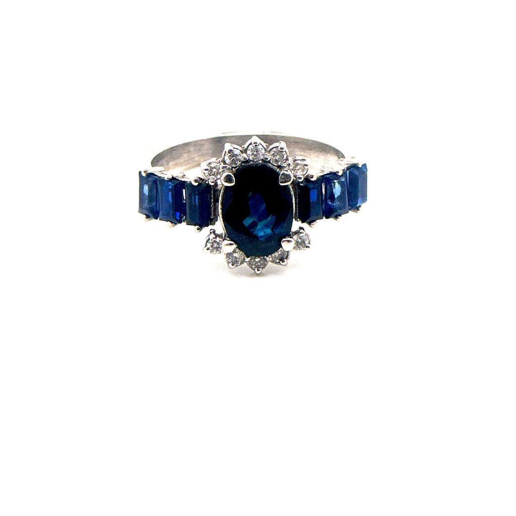 Anillo zafiro central oval y zafiros baggete con diamantes
