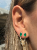 Cascada de diamantes con esmeraldas gota.