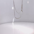 Cadena 9 diamantes oro amarillo y oro blanco