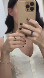 Anillo zafiro central oval y zafiros baggete con diamantes